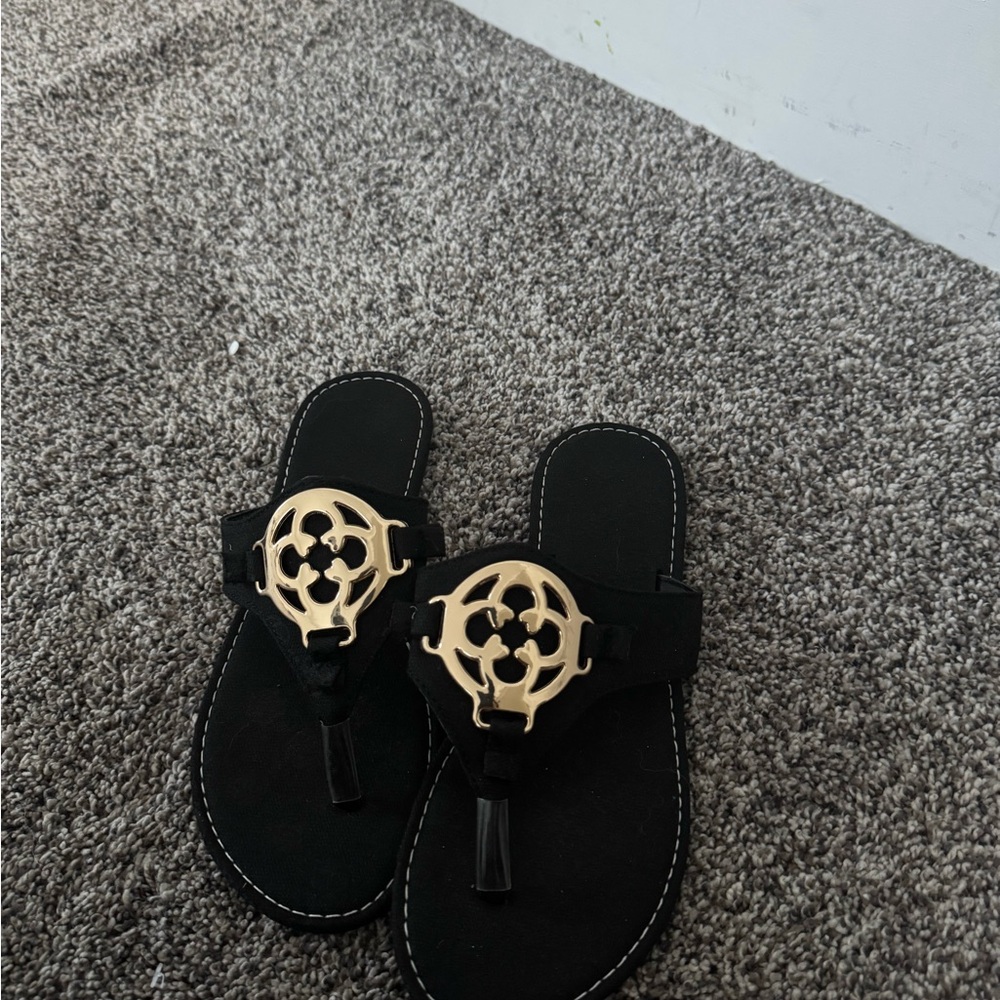 Chic Black Sandals with Gold Detail